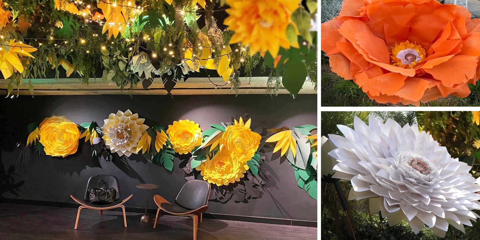 Paper flowers in orange, yellow and white on a dark table